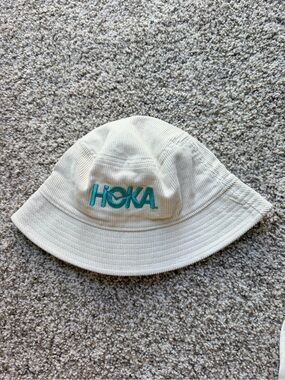 Hoka Cream Bucket Hat with Teal Logo